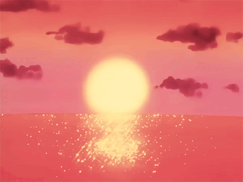gif of a pink and orange sunset at the beach